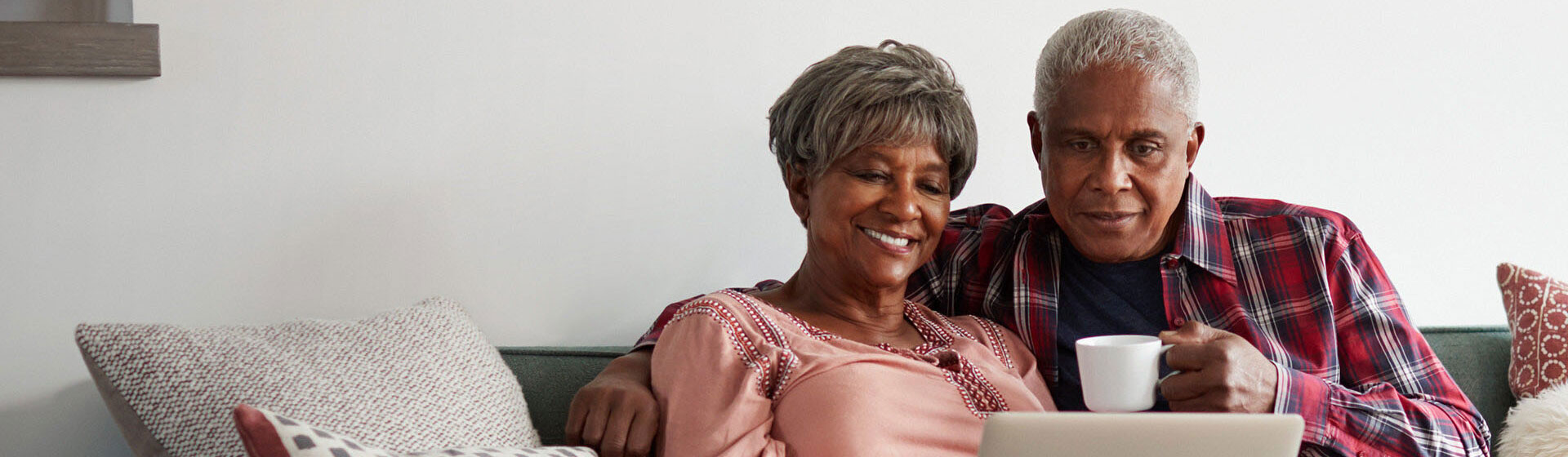 Middle-Aged Couple on Laptop